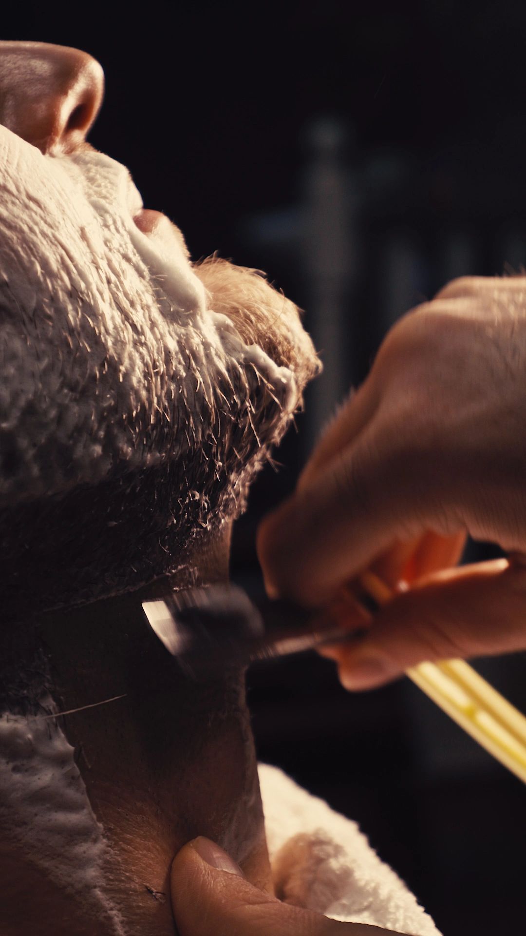 Traditional straight razor beard shaping at Charlie Barbers
